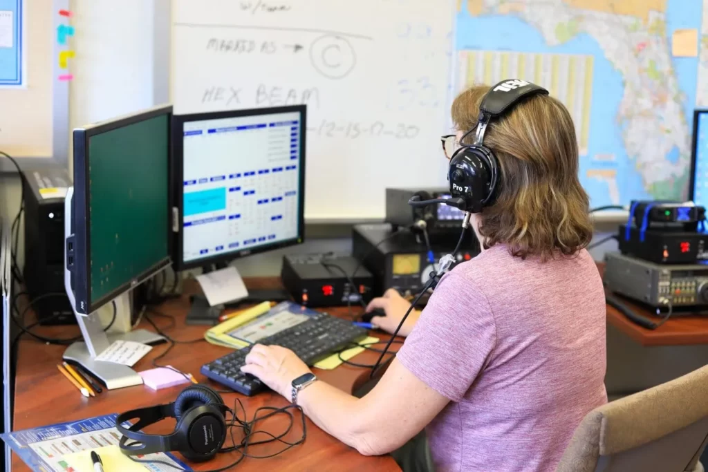 Barbara-Matthews-works-to-make-contact-with-other-amateur-radio-groups-during-the-2025-summer-field-day.-Photo-by-Seth-Johnson-scaled