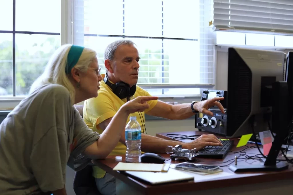 Cy-Stanway-discusses-morse-code-amateur-radio-with-TK.-Photo-by-Seth-Johnson-scaled